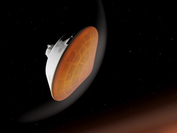BBC Mundo: Cápsula en forma de cono donde viaja Perseverance, en la parte de abajo se ve el escudo térmico calentándose al entrar a la atmósfera